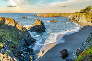 Coastal cliffs along California's Highway 1 in Northern California. Rugged ocean rocks, crashing...