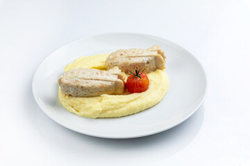 Grilled fillet with french fries and sauce on a wooden plate