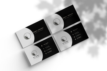 Modern and simple business card design with black and white colour Creative and modern business card template Clean and simple business card template
A business card layout with large script name, 