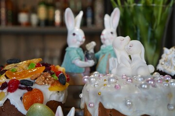 Easter Bunny Decor with Festive Cakes and Bunny Figurines
