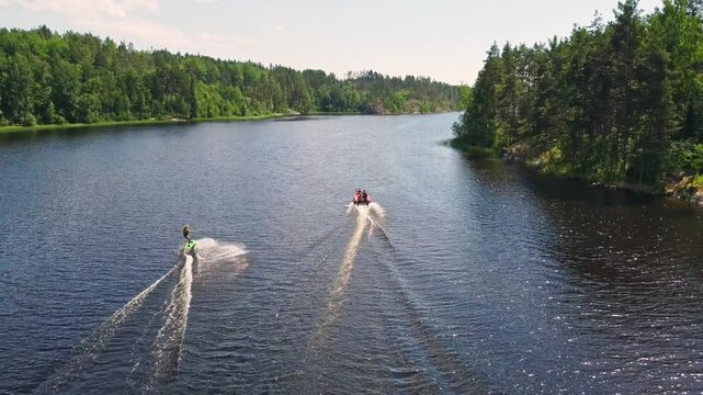 Water sports adventure on a tranquil lake in summer