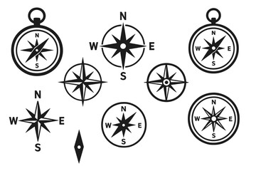 Obraz premium Collection of compass icons featuring various designs and orientations for navigation and mapping purposes