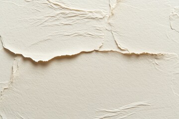 Creamy, textured surface with intricate creases and tears.