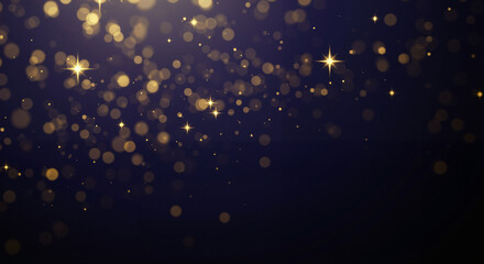 Glittering gold bokeh lights against a dark background  