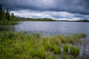Heavy clouds above a lake in the Finnish taiga