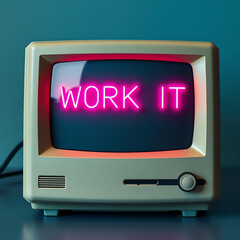 Retro vintage computer with neon pink "WORK IT" text on screen, minimalist aesthetic

