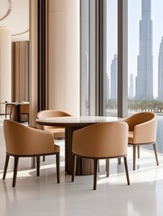 Modern seating arrangement with tan upholstered chairs around a round table, positioned near expansive windows overlooking a city skyline