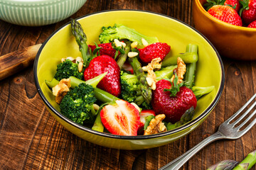 Tasty strawberries, asparagus salad.