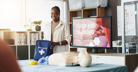 Black woman, teaching and bag for first aid course of rescue safety, demonstration lesson and...