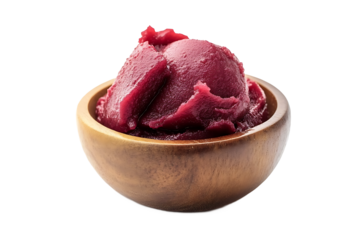 Açaí sorbet in a wooden bowl, a close up view of the frozen dessert on a black background in studio lighting