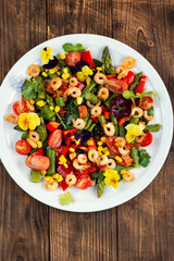 Vegetable salad with seafood.