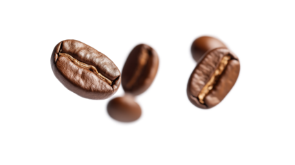 A pile of coffee beans with a white background. The beans are of different sizes and shapes. Concept of warmth and comfort, as coffee is often associated with relaxation and socializing