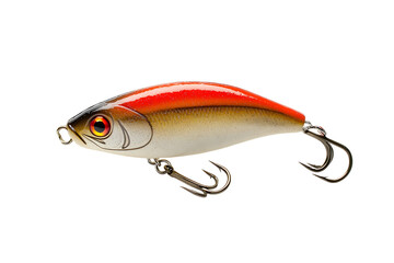 Close up of a fishing lure with red and silver coloring and two treble hooks on a black background
