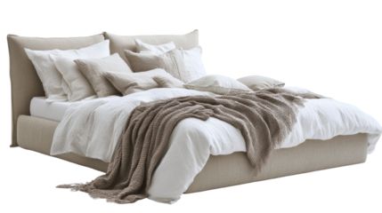 Luxurious linen bed adorned with plush pillows and a cozy throw blanket, isolated