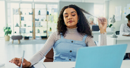 Business woman, laptop and reading in office for inspiration, agenda and administration at desk....