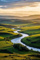 a view of a river running through a lush green valley