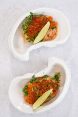 Mini appetizers with red caviar, appetizer idea for a festive table