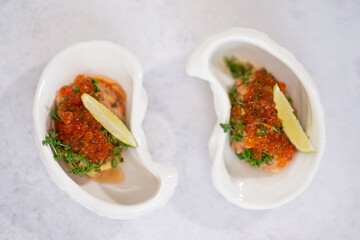 Mini appetizers with red caviar, appetizer idea for a festive table