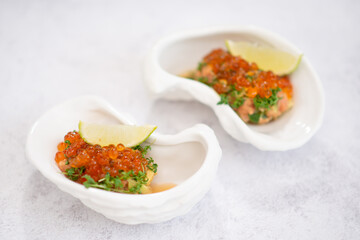 Mini appetizers with red caviar, appetizer idea for a festive table