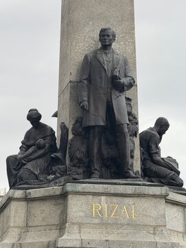 February 2025 - Luneta Park, Manila, Philippines: Rizal Monument with Philippine Flags