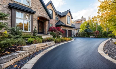 Papier peint photo intissé Freshly paved driveway enhances the curb appeal of a beautiful home in a serene neighborhood