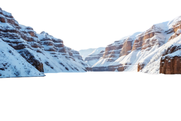 Stunning winter landscape of a snow covered canyon at sunrise. Scenic view of nature's icy beauty.