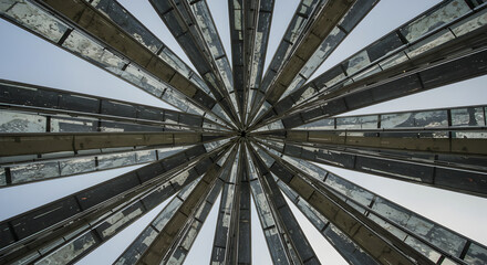 Abstract Radial Structure Of Architectural Framework Against The Blue Sky