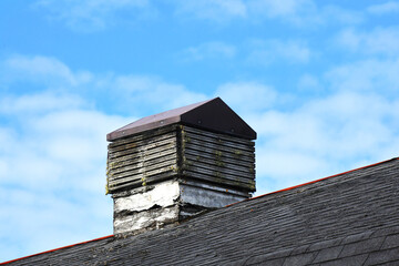 Barn Vent is Wooden and Growing Moss