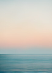 Fototapeta premium Abstract peaceful seascape. Panoramic view of the sunset sky and ocean