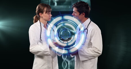Image of data processing over caucasian male and female doctors talking