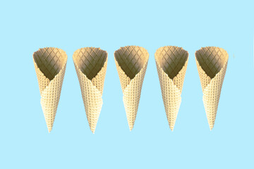 Ice cream cones isolated on blue background. Food summer concept.