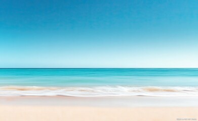 Obraz premium Serene beach landscape; soft sand, turquoise ocean, clear blue sky, calm waves