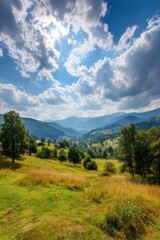 Obraz premium Serene Carpathian Mountain Vista with Rolling Hills and Lush Meadows under a Bright Sunny Sky with Fluffy Clouds Capturing the Essence of Rural Tranquility