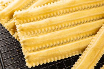 Pasta parpadelle stuffing mushrooms dish vegetable fresh gourmet food background on table rustic...