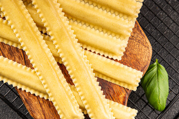 Pasta parpadelle stuffing mushrooms dish vegetable fresh gourmet food background on table rustic...