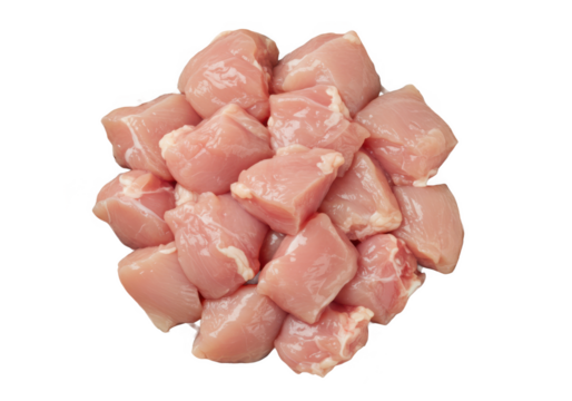 Pile of raw diced chicken pieces isolated on transparent background