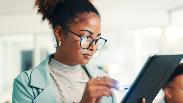 Programmer, woman and writing with tablet in office for coding, software update and web development. Programming, employee and testing digital app with stylus for database integration and debugging