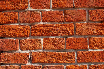 Red brick wall background close up