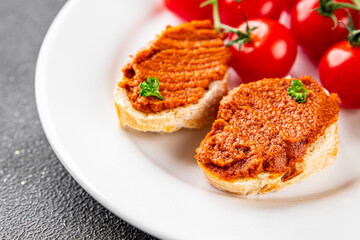 Pepper pate red pepper dip roasted vegetable hummus appetizer vegetable dish fresh gourmet food background on table rustic food top view copy space 