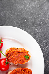 Pepper pate red pepper dip roasted vegetable hummus appetizer vegetable dish fresh gourmet food background on table rustic food top view copy space 