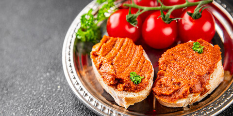 Pepper pate red pepper dip roasted vegetable hummus appetizer vegetable dish fresh gourmet food background on table rustic food top view copy space 