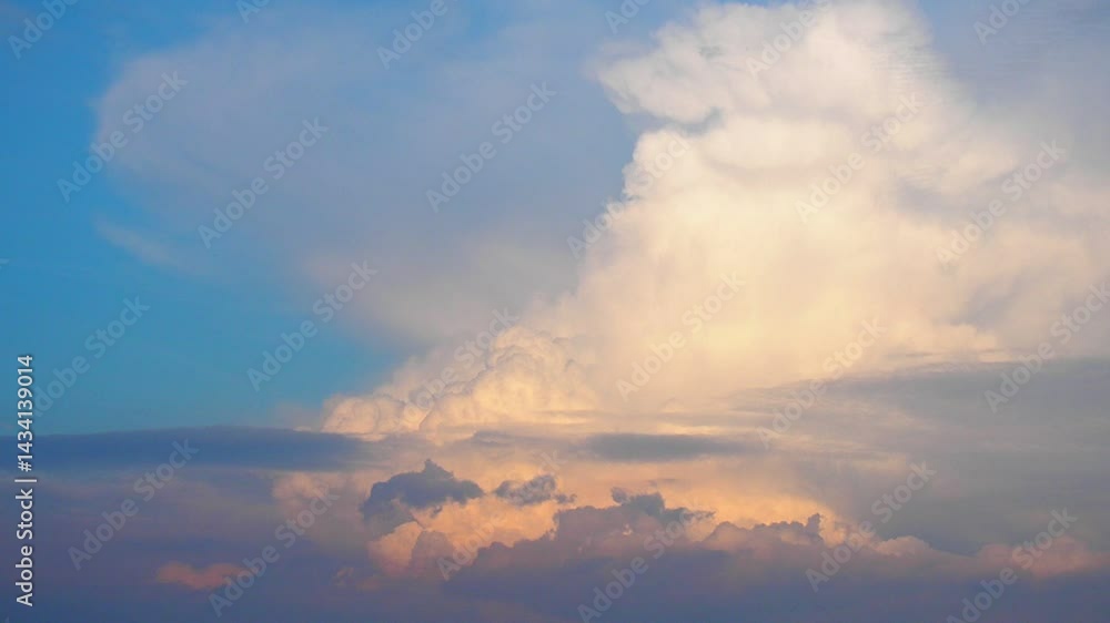 Aufkleber a stunning pink yellow evening cloud emerges gracefully in the twilight sky, casting a serene glow. 