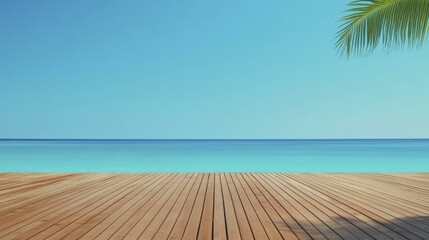 Idyllic tropical seaside scene featuring tranquil turquoise ocean and wooden deck under clear sky with a palm frond.