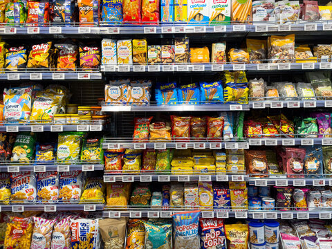 Variety of snack brands on grocery store shelf