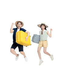 full body Image of asian couple wearing travel clothes and carrying suitcase posing on
 background	
