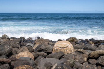 Various colors of stones and Atlantic ocean, Spain