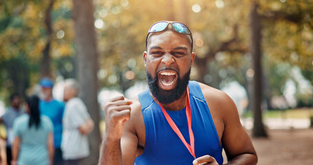 Portrait, runner and man with success and excited for win in nature, marathon and confident. Outdoor, athlete and person with happiness for prize, champion and achievement for race or sports