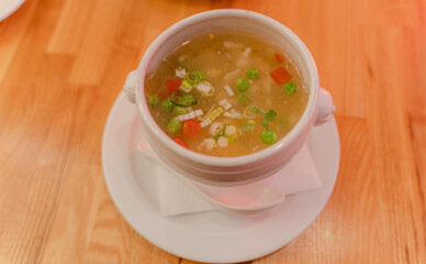 Food. Serving soup in a cafe.