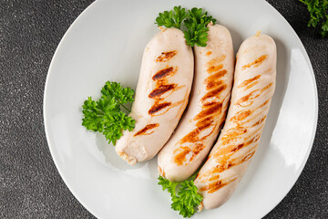 White sausage grill Bockwurst pork meat Bratwurst natural food vegetables dish organic product fresh tasty gourmet food background on the table rustic food top view copy space
