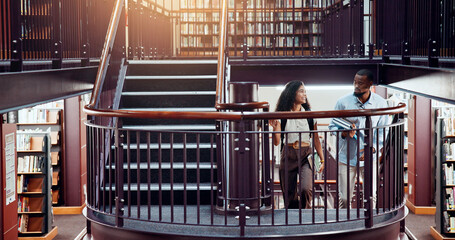 University, students and library stairs with study for information, learning or knowledge for academic citation. Book session, friends and education with research, scholarship and walking people